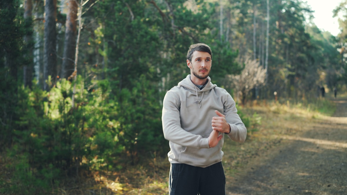 Man taking vitamins after workout